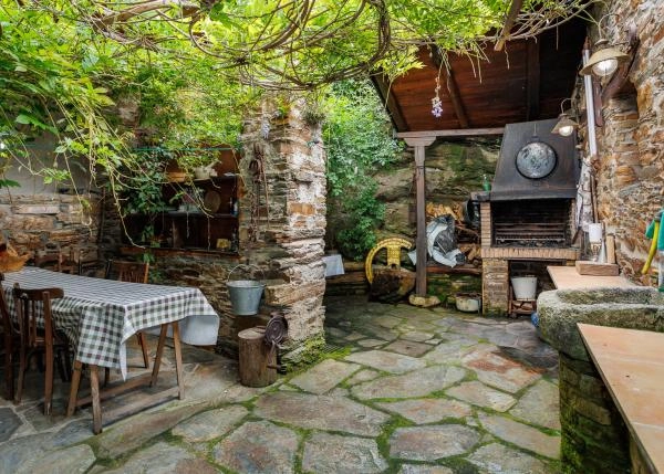 Galicia, Lugo, Navia de Suarna, garden with barbeque casa de campo